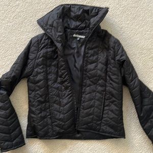 Womens light puffer jacket. Runs small. New, short to the waist coat